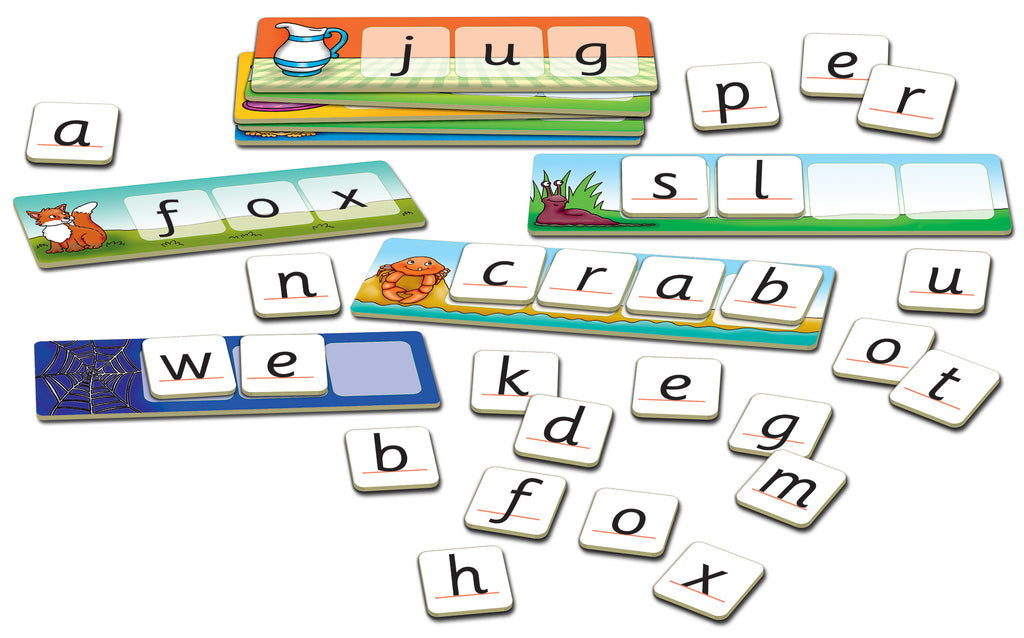 Set of magnetic letters and word cards on a white background