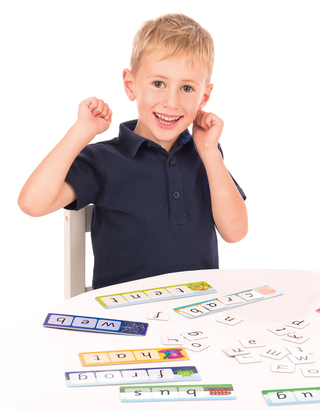 Child in a navy blue shirt with educational materials on a white background