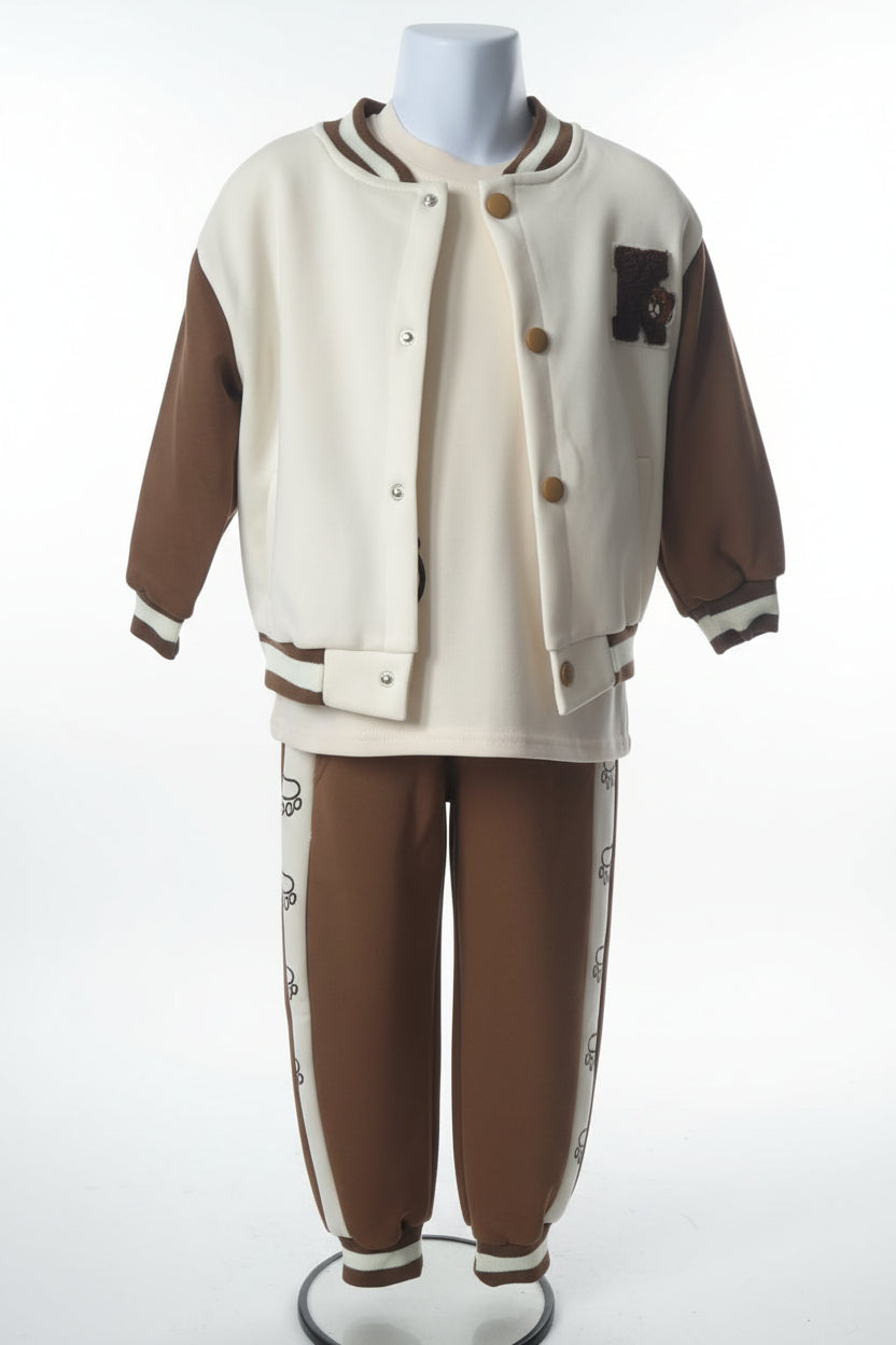 Two-tone jacket and pants set on a mannequin against a plain background