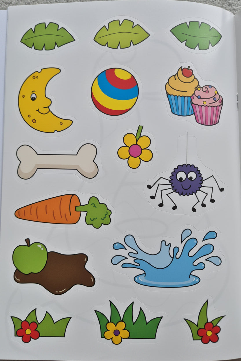 Sheet of colorful stickers including a moon, ball, cupcake, and various other items on a white background.