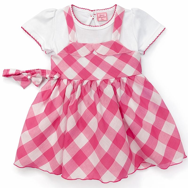 Pink and white checkered dress with a white shirt on a white background